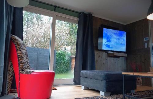 Krachtighuizen Chalet De Esquí | Veluwepark Reewold #Chalet Buizerd# tussen het bosrijke Putten en Garderen