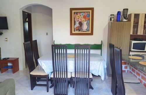 Florianopolis Cabaña | Veranda - Charming 3-bedroom Cottage with AC in Peacefull Daniela Florianopolis