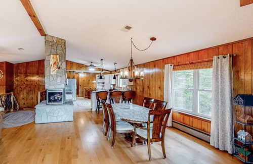 Franklin Casa | View-worthy home lined by trees with a fireplace, wrap-around deck, grill, & W/D