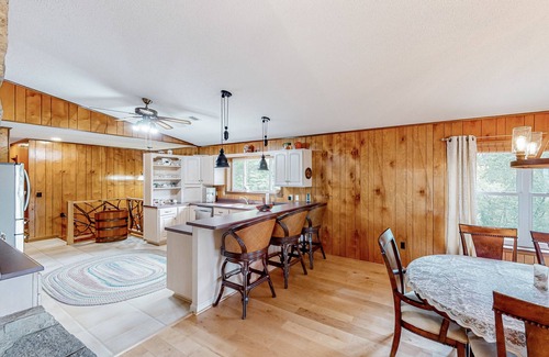 Franklin Casa | View-worthy home lined by trees with a fireplace, wrap-around deck, grill, & W/D