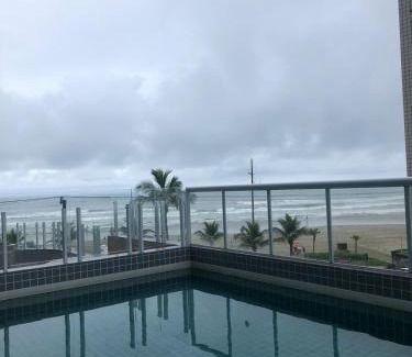 Caicara Apartamento | Vila Caiçara Apto à beira mar! Novinho