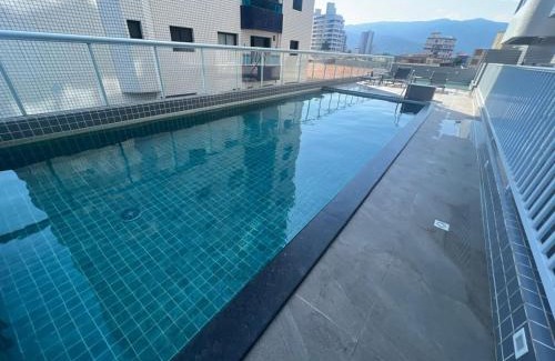 Caicara Apartamento | Vila Caiçara Apto à beira mar! Novinho