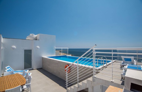 San Tumas Apartamento | Villa Apartamentos con vistas directas al mar y piscina privada.