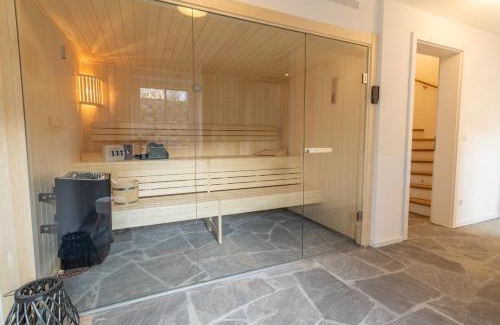 Lohme Casa | Villa BalticBliss auf Rügen - direkt am Golplatz mit Sauna und Jacuzzi