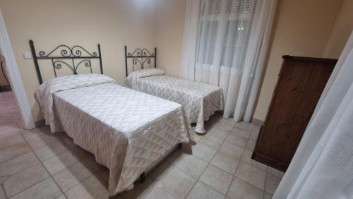 Baena Casa | Villa Carmela