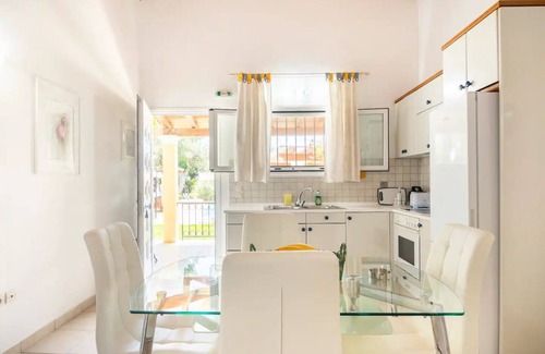 Agios Georgios Villa | Villa- Cassandra 500meters from the beach.