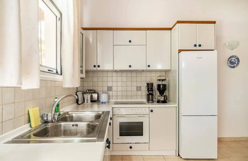 Agios Georgios Villa | Villa- Cassandra 500meters from the beach.
