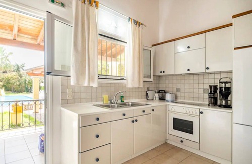 Agios Georgios Villa | Villa- Cassandra 500meters from the beach.