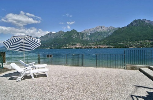 Oliveto Lario Villa | Villa frente al lago con una hermosa vista al lago, piscina y playa privada, Lago Como