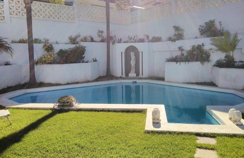 Las Cuevas Villa | Villa 'Famosa 2' con vistas al mar, piscina compartida y Wi-Fi