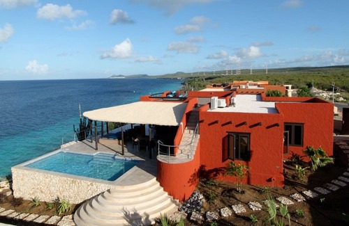 Kralendijk Villa | Villa Kokopelli - Villa de vacaciones con piscina privada en estilo mexicano y vistas al mar