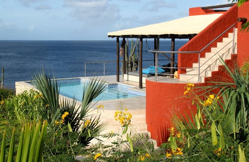 Kralendijk Villa | Villa Kokopelli - Villa de vacaciones con piscina privada en estilo mexicano y vistas al mar