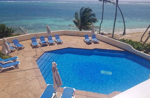 Mamora Bay Villa | Villa May, St James's Club Resort, Beach Front Holiday Home
