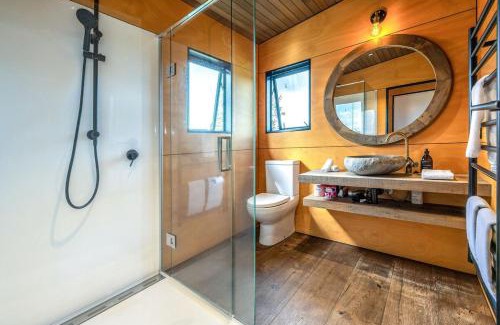 Onetangi Villa | Villa Obsidian including Obsidian Yurts by Waiheke Pure
