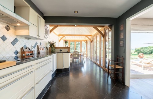 De Haan Casa | Villa Rosetree with sauna and pool table by Interhome
