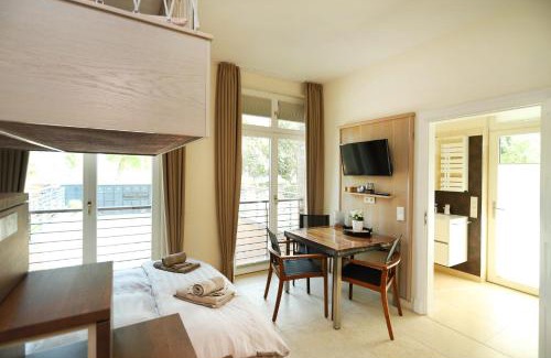 Hohe Dune Apartamento | Villa Schmidt - Strandhaus direkt am Meer mit Sauna, Sport und Dünengarten III