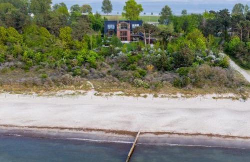 Hohe Dune Apartamento | Villa Schmidt - Strandhaus direkt am Meer mit Sauna, Sport und Dünengarten II