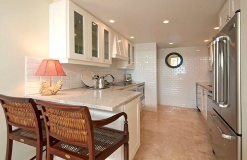 West Bay Condominio | Villa pasos de la arena