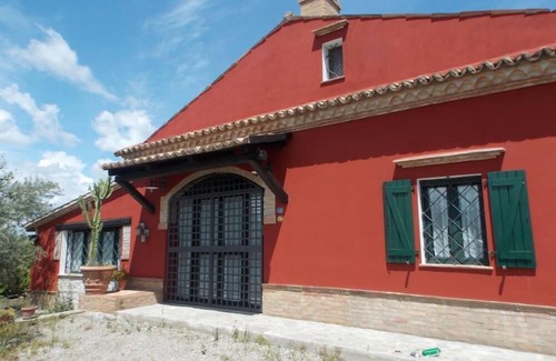 Fabrizio Casa | Villa rodeada de plantaciones de cítricos en la costa jónica