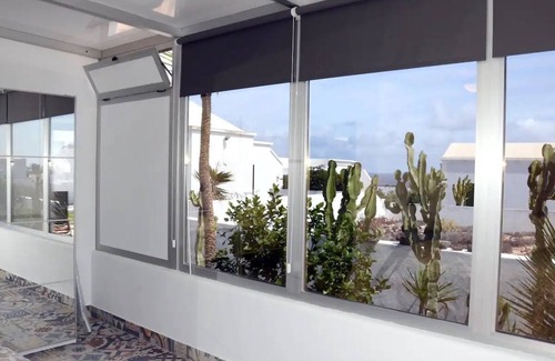 Charco del Palo Villa | Villa Tranquilidad con increíble terraza privada y piscina climatizada