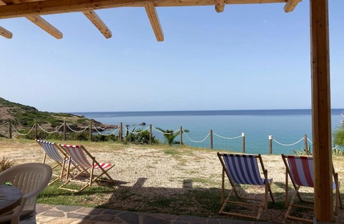 Alghero Apartamento | Villa Wanda - Seafront apartment on Cala Burantino with private cove