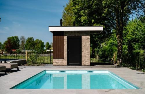 Waarland Casa | Villa Watergloed a stylish, brand new holiday home for 16 people