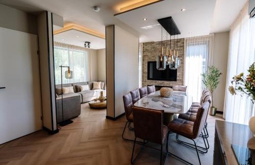 Waarland Casa | Villa Watergloed a stylish, brand new holiday home for 16 people