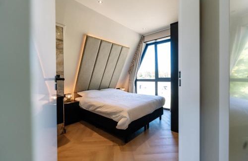 Waarland Casa | Villa Watergloed a stylish, brand new holiday home for 16 people