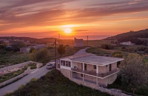 Elation Casa | Villa windmill Near Shipwreck Beach by "elite"