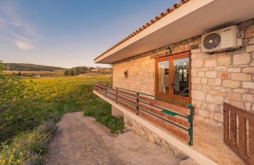 Elation Casa | Villa windmill Near Shipwreck Beach by "elite"