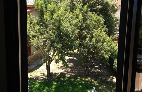 Posada Casa | Villa con jardín y plaza de parking para tus vacaciones ideales.