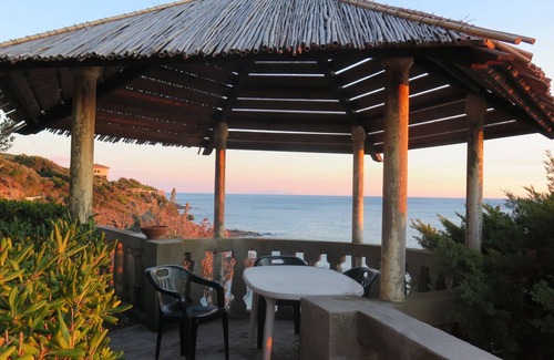 Rosignano Marittimo Villa | Villa con parque directamente en el mar, playa de arena y costa rocosa, vista inolvidable