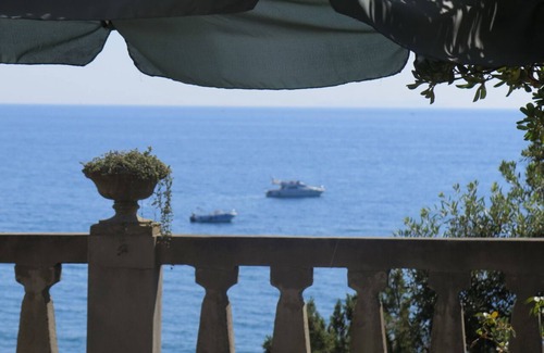 Rosignano Marittimo Villa | Villa con parque directamente en el mar, playa de arena y costa rocosa, vista inolvidable