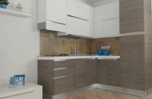 Porto Pino Casa | Casa Rubina, villa cerca del mar con jardín privado
