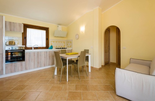 Baia Caddinas Apartamento | Villaggio Perlacea - Apartamento panorámico en la primera fila con una gran terraza panor��mica