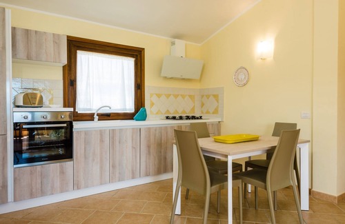 Baia Caddinas Apartamento | Villaggio Perlacea - Apartamento panorámico en la primera fila con una gran terraza panor��mica