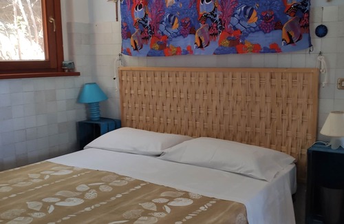 Milazzo Cabaña | Villa Cueva de Oro en Cabo Milazzo, con playa contigua