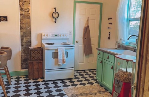 Dowagiac Cabaña | Vintage Romance Finds Cozy Charm at Depot Cottage