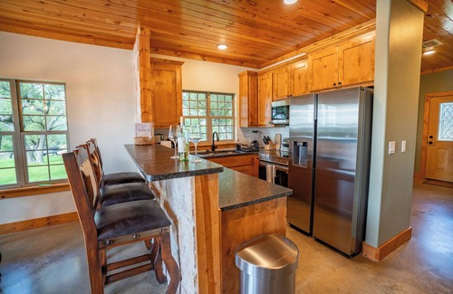 Lometa Cabaña | Vista Cottage & Pool on Exquisite Hill Country Ranch Giraffes, rhino & Zebras