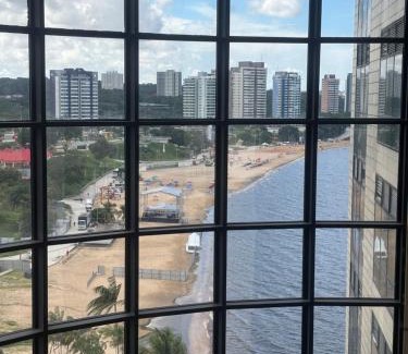 Ponta Negra Apartamento | Vista Incrível e Varanda Gourmet no Tropical Executive