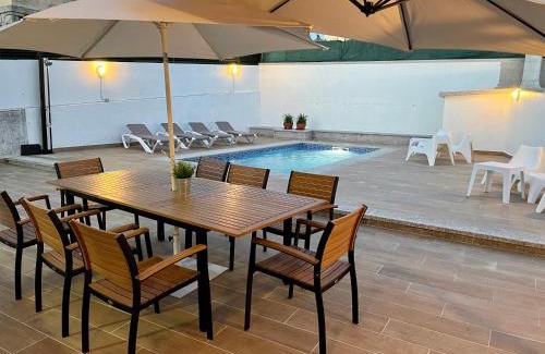 Aios Casa | Vivienda adosada con piscina cerca de la playa