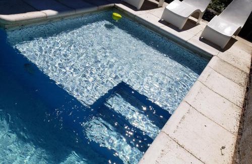 Villa Carlos Paz Cabina | ViviSierras, Carlos Paz casa centro frente al lago, pileta climatizada, 4 dormitorios, 3 baños, quincho