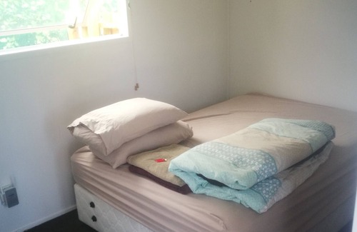 Waihi Beach Cabina | Waihi Beach Studio en un hermoso jardín nativo a 2 minutos a pie de la playa