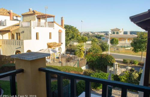 Costa Esuri Casa | (WAR002) Town House with Garden and Pool Access
