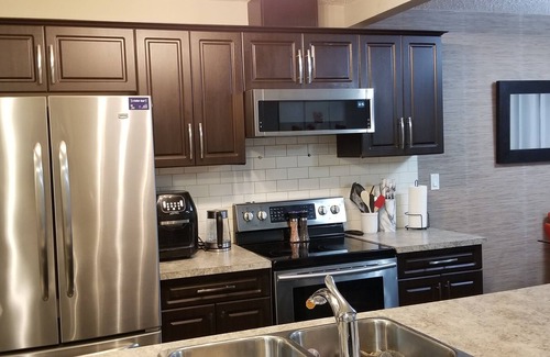 Southeast Edmonton Casa | Warm and cozy 2master bedrooms with free parking ,internet &close to the airport