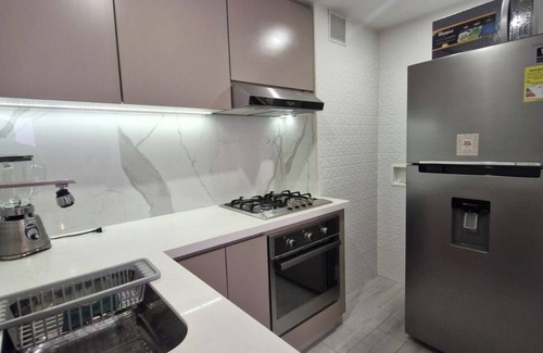 Chico Norte III Apartamento | Warm fireplace and Patio - Smart TV