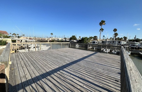 Port Isabel Cabaña | Water front Cottage with beautiful deck to enjoy South Texas Sunset.