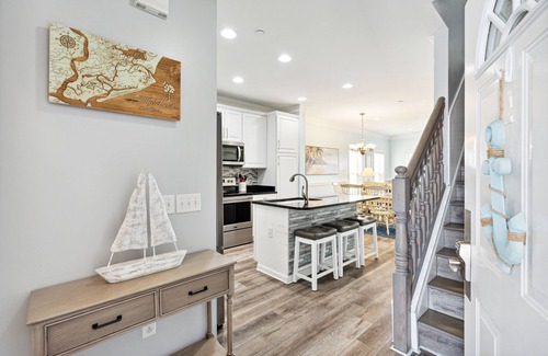 Waters Edge Casa | Water's Edge 114 - River Daze - Premier Riverfront Townhome - Pool & Fishing Pier!