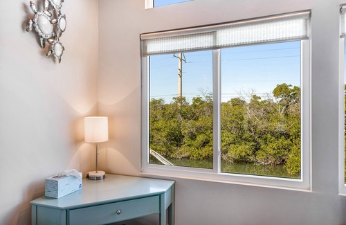 Lower Matecumbe Beach Casa | Water-view house with private dock, washer/dryer & grill - snowbird-friendly