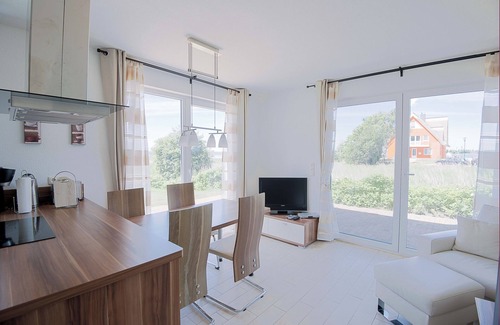Neuenkirchen Casa | Vista al mar, 1 Una ubicación con vistas al agua y puerto, sauna, chimenea, inalámbrico